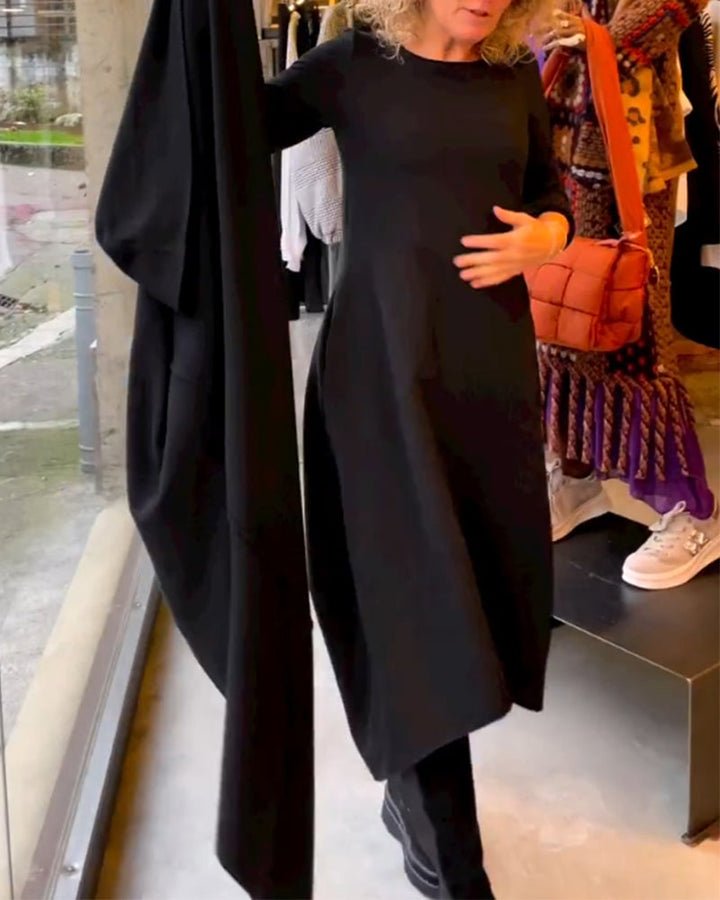 Schwarzes Midikleid mit Eva™-Taschen - Eleganz und Komfort in einem Design