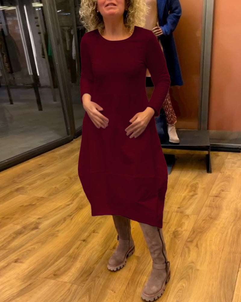 Schwarzes Midikleid mit Eva™-Taschen - Eleganz und Komfort in einem Design