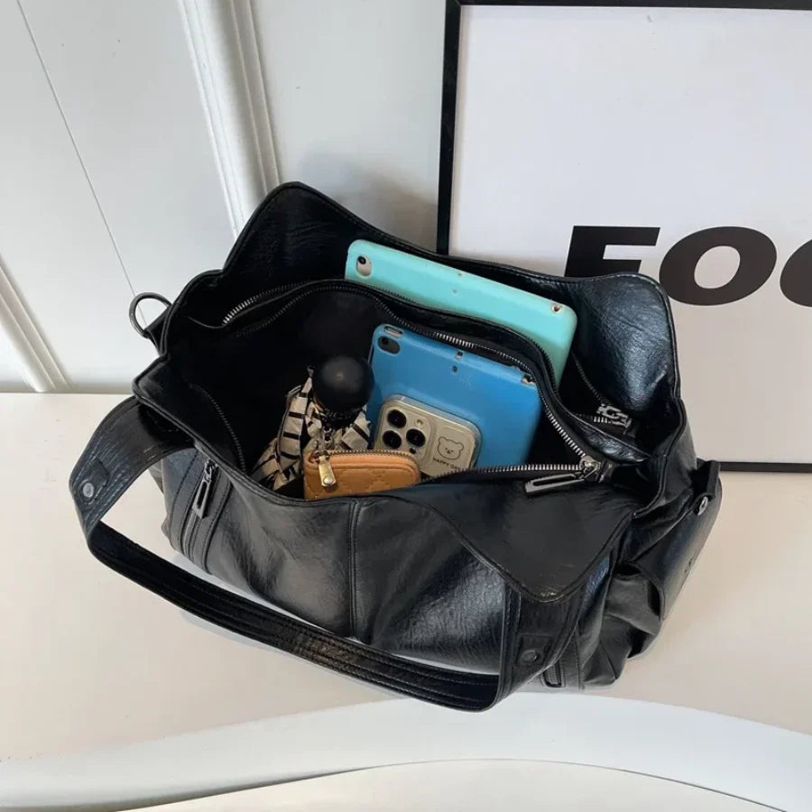 Nivea™ - Elegante und geräumige Tote Bag aus Leder