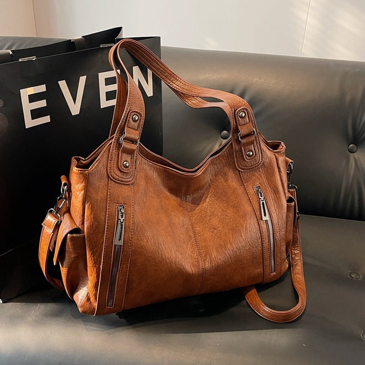 Nivea™ - Elegante und geräumige Tote Bag aus Leder
