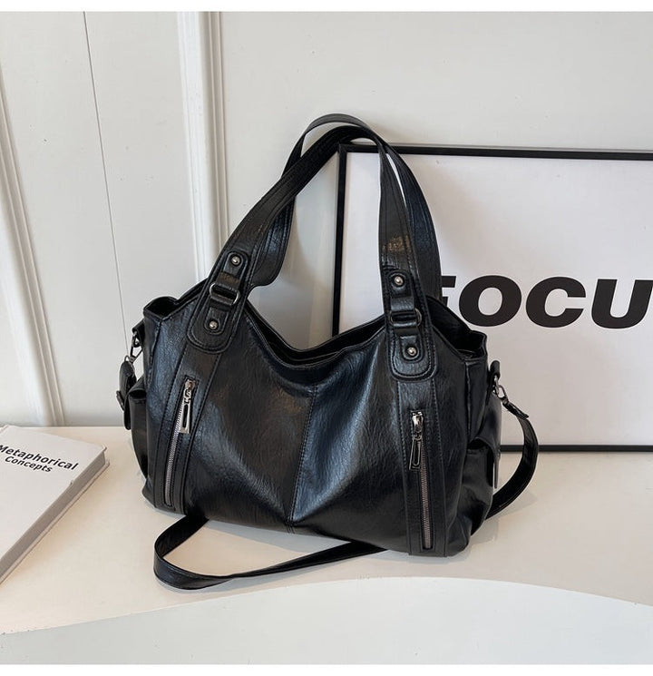 Nivea™ - Elegante und geräumige Tote Bag aus Leder