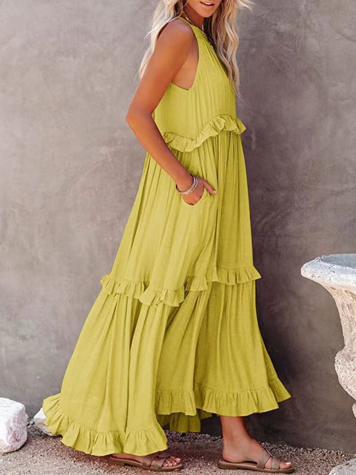 Romola™ - Elegantes langes ärmelloses Kleid mit Rüschen und praktischen Taschen