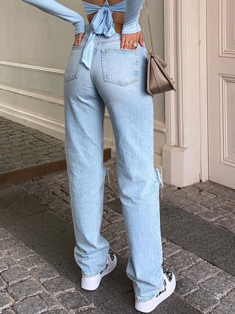 Eleganckie damskie jeansy z trendy podartym wzorem dla stylowej kobiety