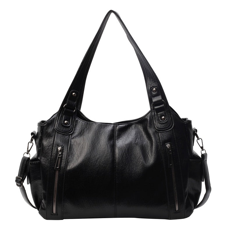 Nivea™ - Elegante und geräumige Tote Bag aus Leder