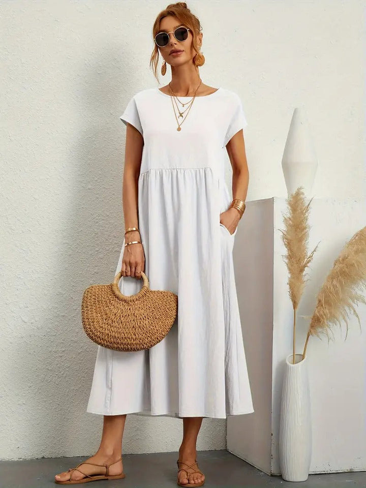 Brigida™ - Raffiniertes Sommerkleid aus Leinen mit bequemen Taschen