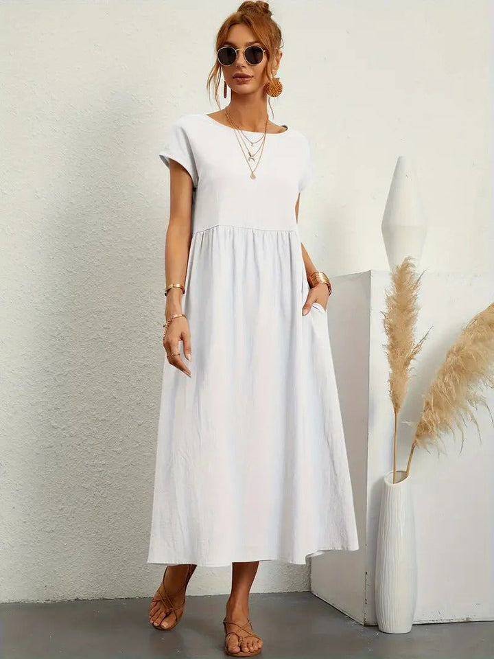 Brigida™ - Raffiniertes Sommerkleid aus Leinen mit bequemen Taschen