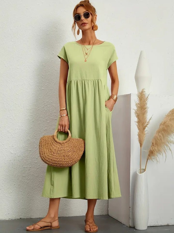 Brigida™ - Raffiniertes Sommerkleid aus Leinen mit bequemen Taschen