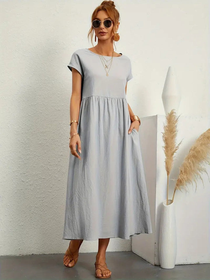 Brigida™ - Raffiniertes Sommerkleid aus Leinen mit bequemen Taschen