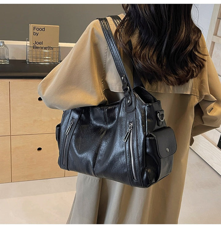 Nivea™ - Elegante und geräumige Tote Bag aus Leder