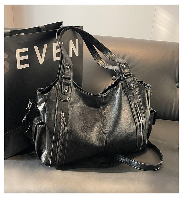 Nivea™ - Elegante und geräumige Tote Bag aus Leder