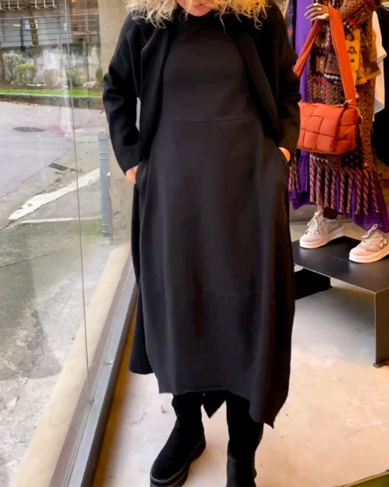 Schwarzes Midikleid mit Eva™-Taschen - Eleganz und Komfort in einem Design